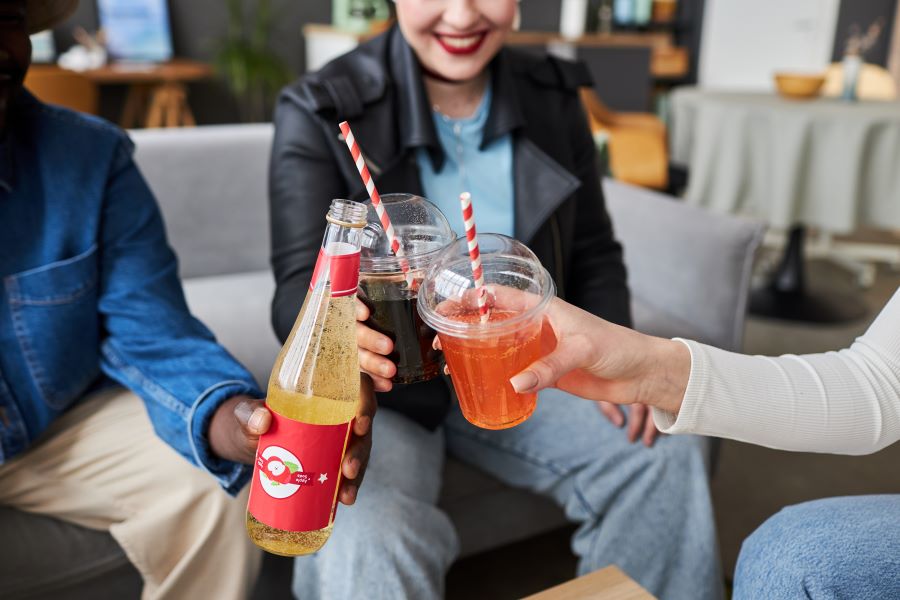 Group toasting with sodas